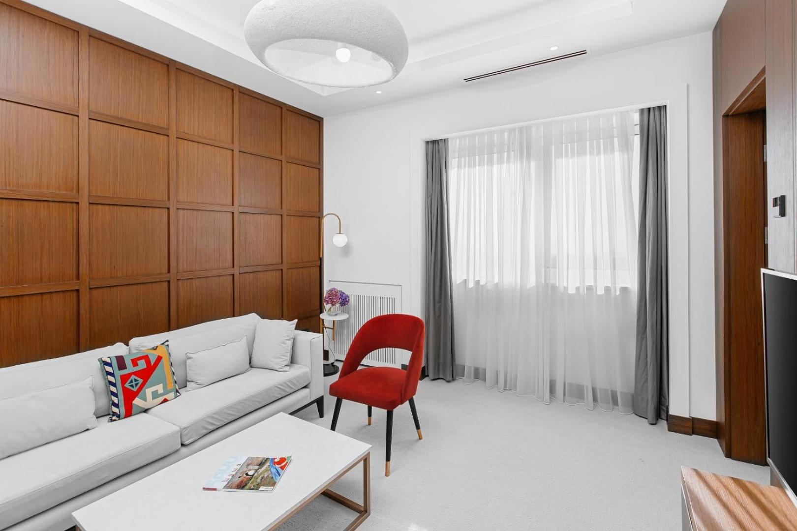 Qafqaz Riverside Hotel Gabala Exterior photo A room at the hotel